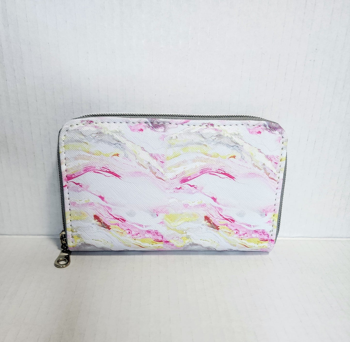 Pastel colors zip around wallet